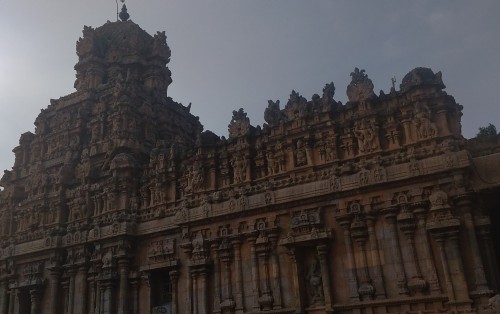 Brihadishvara Temple, also called Rajarajesvaram or Peruvudaiyār Kōvil, is a Hindu temple dedicated to Shiva located in South bank of Kaveri river in Thanjavur, Tamil Nadu, India. It is one of the largest South Indian temples and an exemplary example of a fully realized Dravidian architecture. It is called as Dhakshina Meru (Meru of south). Built by Tamil king Raja Raja Chola I between 1003 and 1010 AD, the temple is a part of the UNESCO World Heritage Site known as the "Great Living Chola Temples", along with the Chola dynasty era Gangaikonda Cholapuram temple and Airavatesvara temple that are about 70 kilometres (43 mi) and 40 kilometres (25 mi) to its northeast respectively.