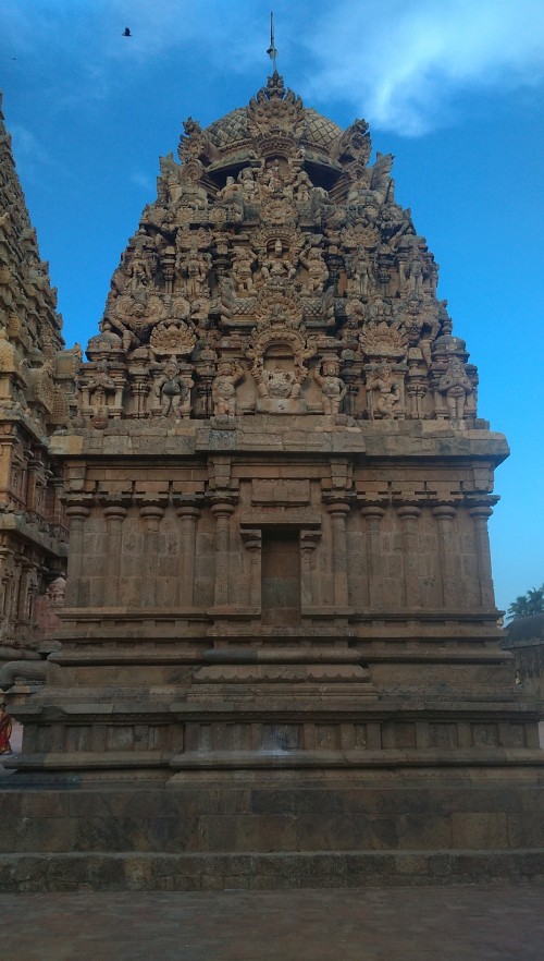 Brihadishvara Temple, also called Rajarajesvaram or Peruvudaiyār Kōvil, is a Hindu temple dedicated to Shiva located in South bank of Kaveri river in Thanjavur, Tamil Nadu, India. It is one of the largest South Indian temples and an exemplary example of a fully realized Dravidian architecture. It is called as Dhakshina Meru (Meru of south). Built by Tamil king Raja Raja Chola I between 1003 and 1010 AD, the temple is a part of the UNESCO World Heritage Site known as the "Great Living Chola Temples", along with the Chola dynasty era Gangaikonda Cholapuram temple and Airavatesvara temple that are about 70 kilometres (43 mi) and 40 kilometres (25 mi) to its northeast respectively.