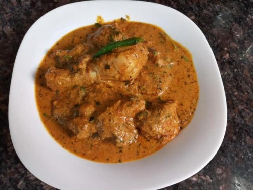 METHOD :

FOR MARINATION CHICKEN -

600 grams chicken,
Red chili powder 1 teaspoon,
Ginger garlic paste 1 teaspoon ,
Salt 1 teaspoon ,
Turmeric powder 1/2 teaspoon,
Yogurt - 100 gram ,
Lemon juice - 1 tablespoon ,
Garam masala powder - 1/2 teaspoon .
MIX AND MARINATE FOR 30 MINUTES

MASALA FOR GRAVY

Heat clarified butter - 4 tablespoon,
add onions - 2 medium sized sliced ,
Cashew nuts - 12
Almonds - 12
Fry till they turn light brown Grind them along with 1 cup milk
Keep the ground paste aside

Procedure:

In a pan add 1 teaspoon butter
Add marinated chicken and cook till chicken turns 80% tender

FOR GRAVY

In the same ghee of fried onions add 2 teaspoon Ginger garlic paste and fry
Add tomato paste of - 4 medium sized tomatoes
Fry them too Add Coriander powder - 1 tablespoon ,
Chat masala - 1 teaspoon,
Kashmiri red chilli powder - 1 tablespoon
And roast them till oil separates
Add the onion paste and roast again
Then add fresh milk cream - 3 tablespoon,
Mix it

Now add the cooked chicken to it and again mix it and cook well

Add dried fenugreek leaves (kasturi methi) - 2 tablespoon
Add few coriander leaves and 3 sliced green chillies.
Mix well add some water and cook till chicken is tender. Chicken changezi is ready to serve. Serve with onion slices & lemon wedges accompanied by Jeera rice ,nans, kulcha’s or tandoori roti.