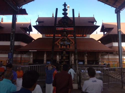 The Guruvayur Temple is a famous Sri Krishna temple and is one of the most important places of worship for Hindus and is often referred to as "Bhooloka Vaikuntam which translates to the holy abode of Vishnu on Earth. The divine idol installed here represents the enchanting form of Bhagvan Vishnu endowed with the four lustrous arms carrying the conch Panchajanya, the discus Sudarshana Chakra, the mace Kaumodaki and the lotus. Adorned with the divine Tulasi garland the idol represents the majestic form of Maha Vishnu as revealed to Vasudeva and Devaki at the time of Krishna Avatar. The presiding deity in the sanctum-sanctorum is Mahavishnu. He faces east and his idol is 4 ft tall. Even though this is not a much small idol, devotees consider him as Little Krishna.