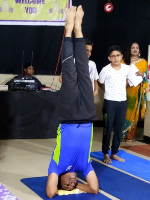 In the Supported Headstand, the body is completely inverted, and held upright supported by the forearms and the crown of the head.