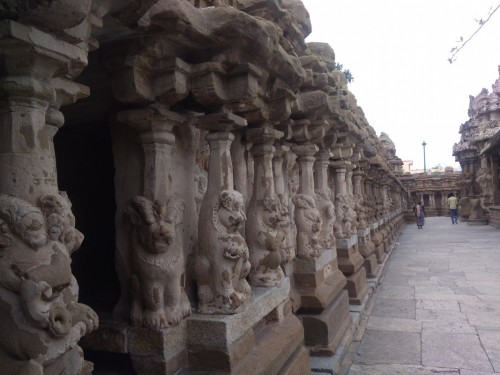 The Kanchi Kailasanathar temple is the oldest structure in Kanchipuram. Located in Tamil Nadu, India, it is a Hindu temple in the Tamil architectural style. It is dedicated to the Lord Shiva, and is known for its historical importance. The temple was built from 685-705 AD by a Rajasimha (Narasimhavarman II) ruler of the Pallava Dynasty. The low-slung sandstone compound contains a large number of carvings, including many half-animal deities which were popular during the early Pallava architectural period.The structure contains 58 small shrines which are dedicated to various forms of Shiva. These are built into niches on the inner face of the high compound wall of the circumambulatory passage. The temple is one of the most prominent tourist attractions of the city