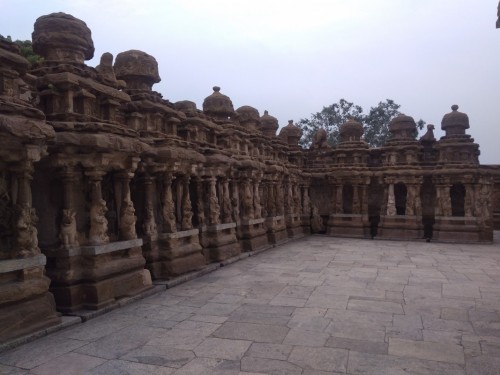 The Kanchi Kailasanathar temple is the oldest structure in Kanchipuram. Located in Tamil Nadu, India, it is a Hindu temple in the Tamil architectural style. It is dedicated to the Lord Shiva, and is known for its historical importance. The temple was built from 685-705 AD by a Rajasimha (Narasimhavarman II) ruler of the Pallava Dynasty. The low-slung sandstone compound contains a large number of carvings, including many half-animal deities which were popular during the early Pallava architectural period.The structure contains 58 small shrines which are dedicated to various forms of Shiva. These are built into niches on the inner face of the high compound wall of the circumambulatory passage. The temple is one of the most prominent tourist attractions of the city