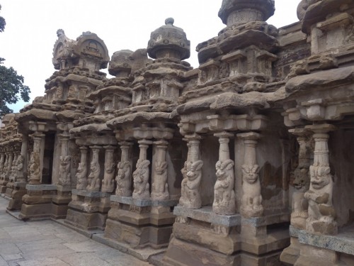 The Kanchi Kailasanathar temple is the oldest structure in Kanchipuram. Located in Tamil Nadu, India, it is a Hindu temple in the Tamil architectural style. It is dedicated to the Lord Shiva, and is known for its historical importance. The temple was built from 685-705 AD by a Rajasimha (Narasimhavarman II) ruler of the Pallava Dynasty. The low-slung sandstone compound contains a large number of carvings, including many half-animal deities which were popular during the early Pallava architectural period.The structure contains 58 small shrines which are dedicated to various forms of Shiva. These are built into niches on the inner face of the high compound wall of the circumambulatory passage. The temple is one of the most prominent tourist attractions of the city