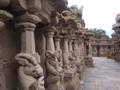 The Kanchi Kailasanathar temple is the oldest structure in Kanchipuram. Located in Tamil Nadu, India, it is a Hindu temple in the Tamil architectural style. It is dedicated to the Lord Shiva, and is known for its historical importance. The temple was built from 685-705 AD by a Rajasimha (Narasimhavarman II) ruler of the Pallava Dynasty. The low-slung sandstone compound contains a large number of carvings, including many half-animal deities which were popular during the early Pallava architectural period.The structure contains 58 small shrines which are dedicated to various forms of Shiva. These are built into niches on the inner face of the high compound wall of the circumambulatory passage. The temple is one of the most prominent tourist attractions of the city