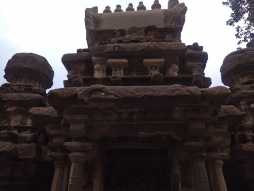 The Kanchi Kailasanathar temple is the oldest structure in Kanchipuram. Located in Tamil Nadu, India, it is a Hindu temple in the Tamil architectural style. It is dedicated to the Lord Shiva, and is known for its historical importance. The temple was built from 685-705 AD by a Rajasimha (Narasimhavarman II) ruler of the Pallava Dynasty. The low-slung sandstone compound contains a large number of carvings, including many half-animal deities which were popular during the early Pallava architectural period.The structure contains 58 small shrines which are dedicated to various forms of Shiva. These are built into niches on the inner face of the high compound wall of the circumambulatory passage. The temple is one of the most prominent tourist attractions of the city