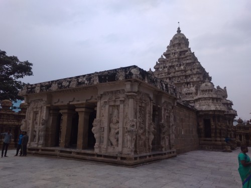 The Kanchi Kailasanathar temple is the oldest structure in Kanchipuram. Located in Tamil Nadu, India, it is a Hindu temple in the Tamil architectural style. It is dedicated to the Lord Shiva, and is known for its historical importance. The temple was built from 685-705CE by a Rajasimha (Narasimhavarman II) ruler of the Pallava Dynasty. The low-slung sandstone compound contains a large number of carvings, including many half-animal deities which were popular during the early Pallava architectural period. The structure contains 58 small shrines which are dedicated to various forms of Shiva. These are built into niches on the inner face of the high compound wall of the circumambulatory passage.