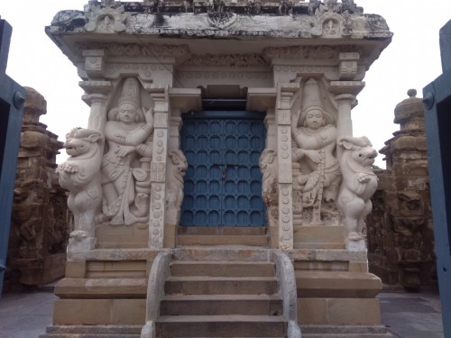 The Kanchi Kailasanathar temple is the oldest structure in Kanchipuram. Located in Tamil Nadu, India, it is a Hindu temple in the Tamil architectural style. It is dedicated to the Lord Shiva, and is known for its historical importance. The temple was built from 685-705CE by a Rajasimha (Narasimhavarman II) ruler of the Pallava Dynasty. The low-slung sandstone compound contains a large number of carvings, including many half-animal deities which were popular during the early Pallava architectural period. The structure contains 58 small shrines which are dedicated to various forms of Shiva. These are built into niches on the inner face of the high compound wall of the circumambulatory passage.