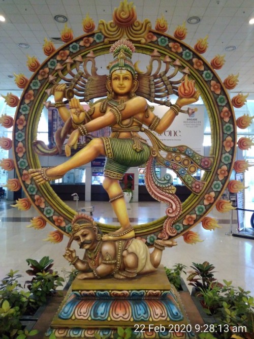 Nataraja is a depiction of the Hindu god Shiva as the divine dancer. His dance is called Tandavam or Nadanta, depending on the context of the dance.The pose and artwork is described in many Hindu texts such as the Anshumadbhed agama and Uttarakamika agama, the dance relief or idol featured in all major Hindu temples of Shaivism.

The sculpture is symbolic of Shiva as the lord of dance and dramatic arts, with its style and proportions made according to Hindu texts on arts. It typically shows Shiva dancing in one of the Natya Shastra poses, holding Agni (fire) in his left back hand, the front hand in gajahasta (elephant hand) or dandahasta (stick hand) mudra, the front right hand with a wrapped snake that is in abhaya (fear not) mudra while pointing to a Sutra text, and the back hand holding a musical instrument, usually a damaru. His body, fingers, ankles, neck, face, head, ear lobes and dress are shown decorated with symbolic items, which vary with historic period and region. He is surrounded by a ring of flames, standing on a lotus pedestal, lifting his left leg (or in rare cases, the right leg) and balancing / trampling upon a demon shown as a dwarf who symbolizes ignorance. The dynamism of the energetic dance is depicted with the whirling hair which spread out in thin strands as a fan behind his head. The details in the Nataraja artwork have been variously interpreted by Indian scholars since the 12th century for its symbolic meaning and theological essence.