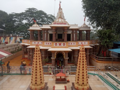 Mahalaxmi Temple is one of the most famous temples of Dahanu situated on Mumbai Ahmedabad Highway in Dahanu area. It is dedicated to Mahalakshmi the central deity of Devi Mahatmyam. This temple was built by Koli king Jayabha Mukne of Jawhar State in 1306 at the establishment of Jawhar.  During the worship The flag of the present Raja of Mukne Dynasty of Jawhar is offered to the mother's temple. The flag is presented by Narayan Satava, the priest of the village of Vaghadi.